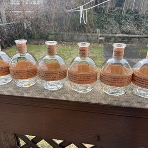 6 empty Blanton’s whiskey bottles ( no stopper)